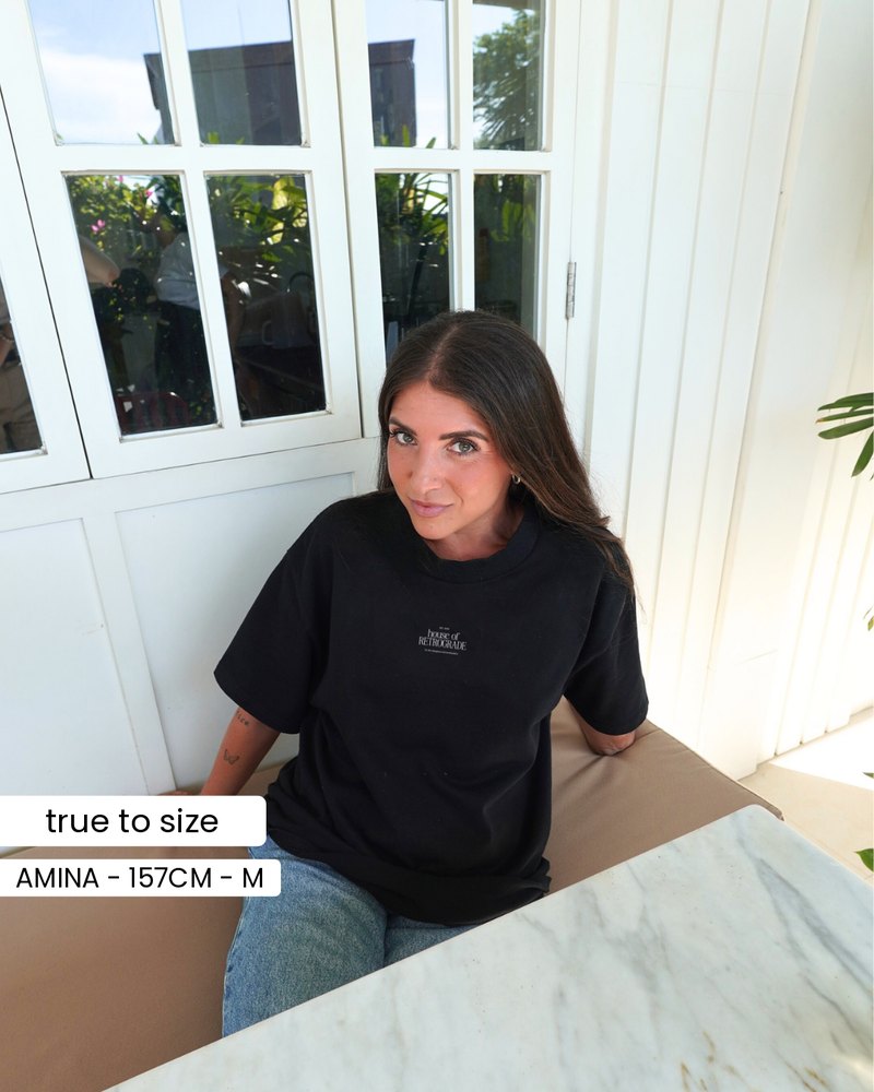 amina wearing the signature t-shirt