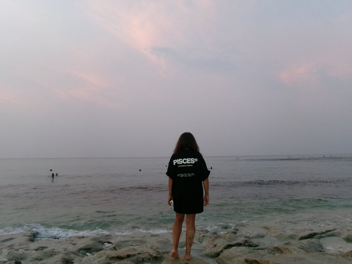 pisces t-shirt at the ocean at dusk